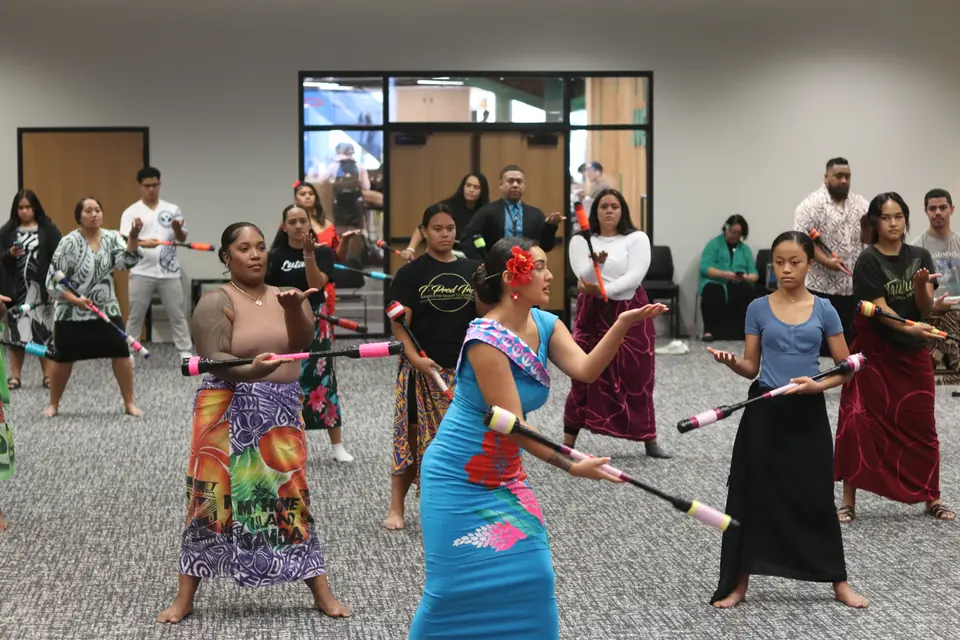 Dancers rehearsing at a Pasifika dance workshop